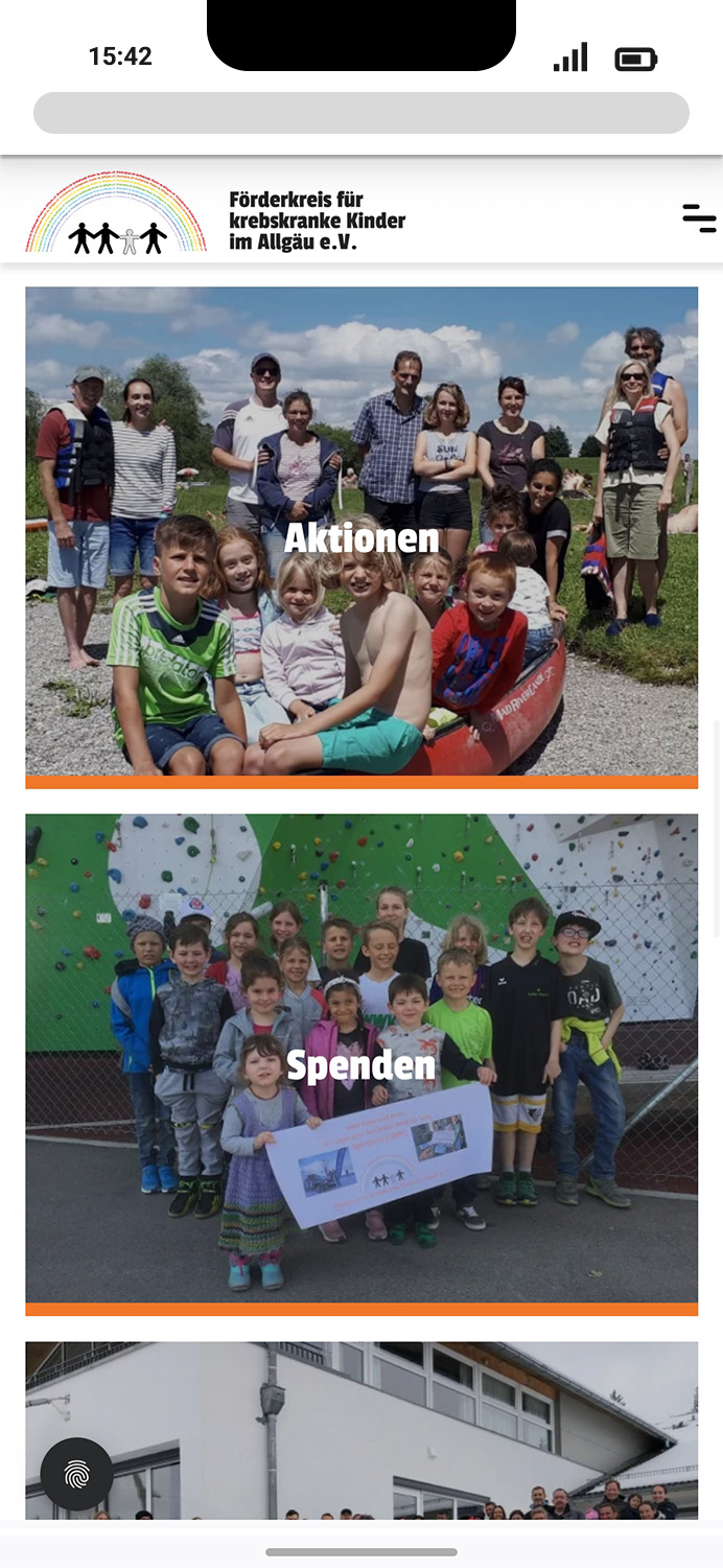 Mobile-Darstellung der Website des Förderkreises für krebskranke Kinder e.V. auf einem Screen, zeigt wichtige Informationen über hier: Boxen mit Aktionen, Spenden, Termine