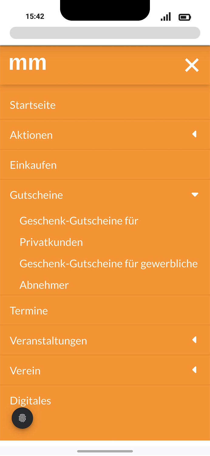 Mobile-Darstellung der Website des Stadtmarketing Memmingen e.V. auf einem Screen, zeigt wichtige Informationen und Benutzerinteraktionen hier: aufgeklapptes Menü